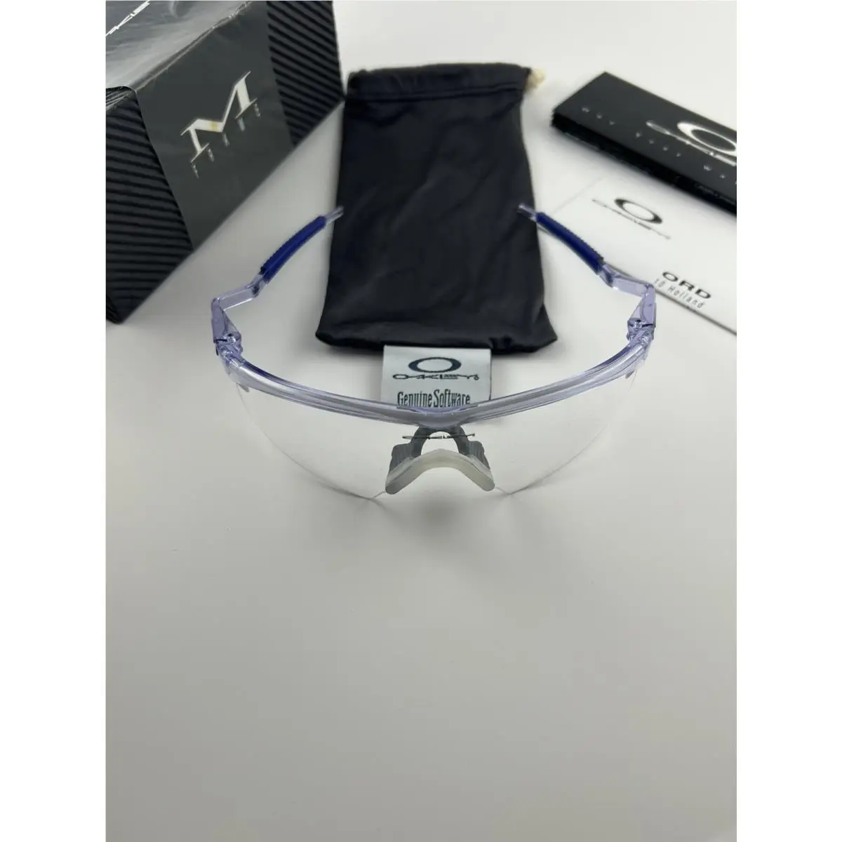 M Frame Crystal Clear Frame Clear Strike Lens Blue Ear Socks Mumbo 06-047 by Oakley