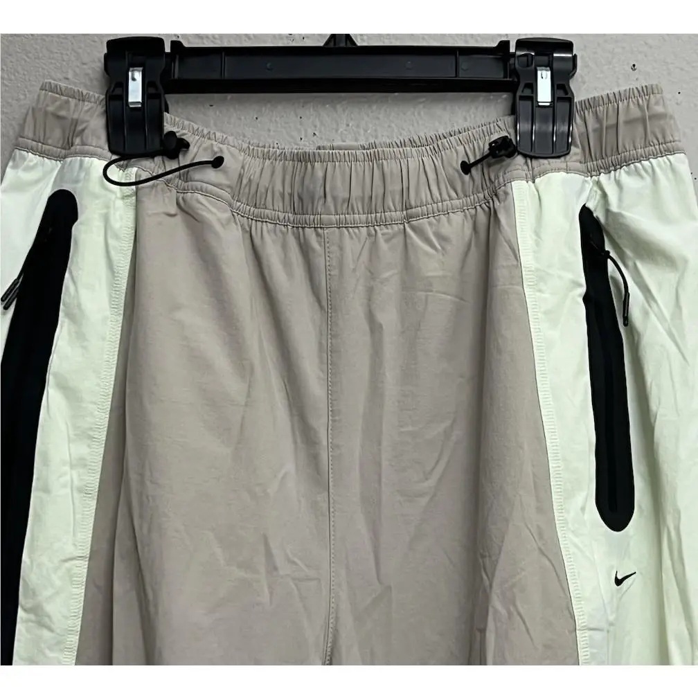 Nike clothing - Nike Tech Woven Loose Fit Pants - IU7502-236 - Cream II (UPC: 198958379122) 1
