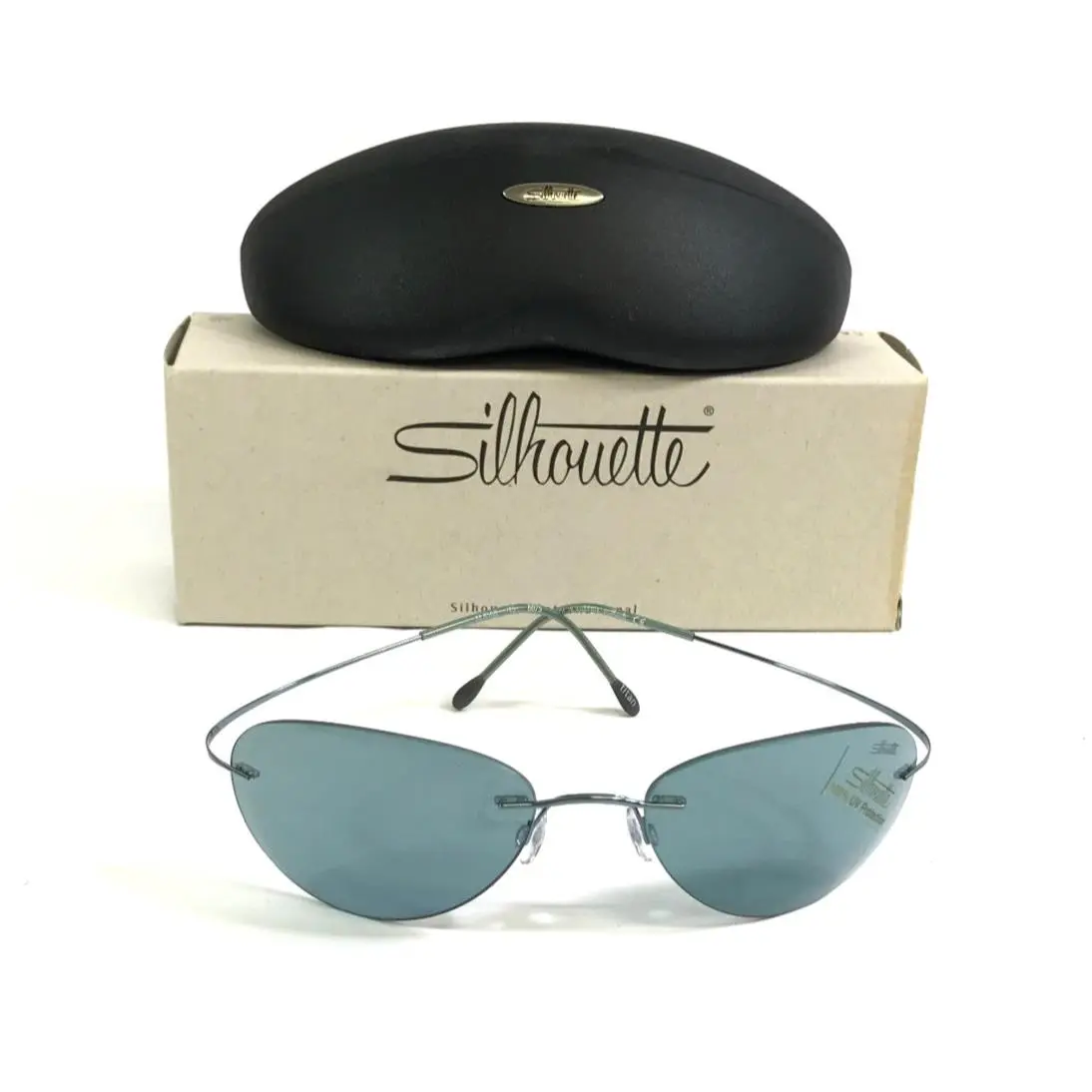 Sunglasses M8588 745 6075 Blue Rimless Wrap Frames with Blue Lenses by Silhouette