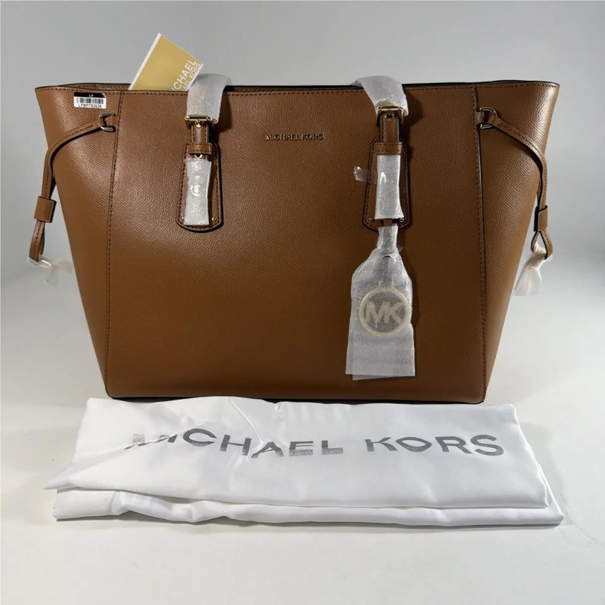 Voyager Leather Top Zip Tote Bag Color Acorn by Michael Kors
