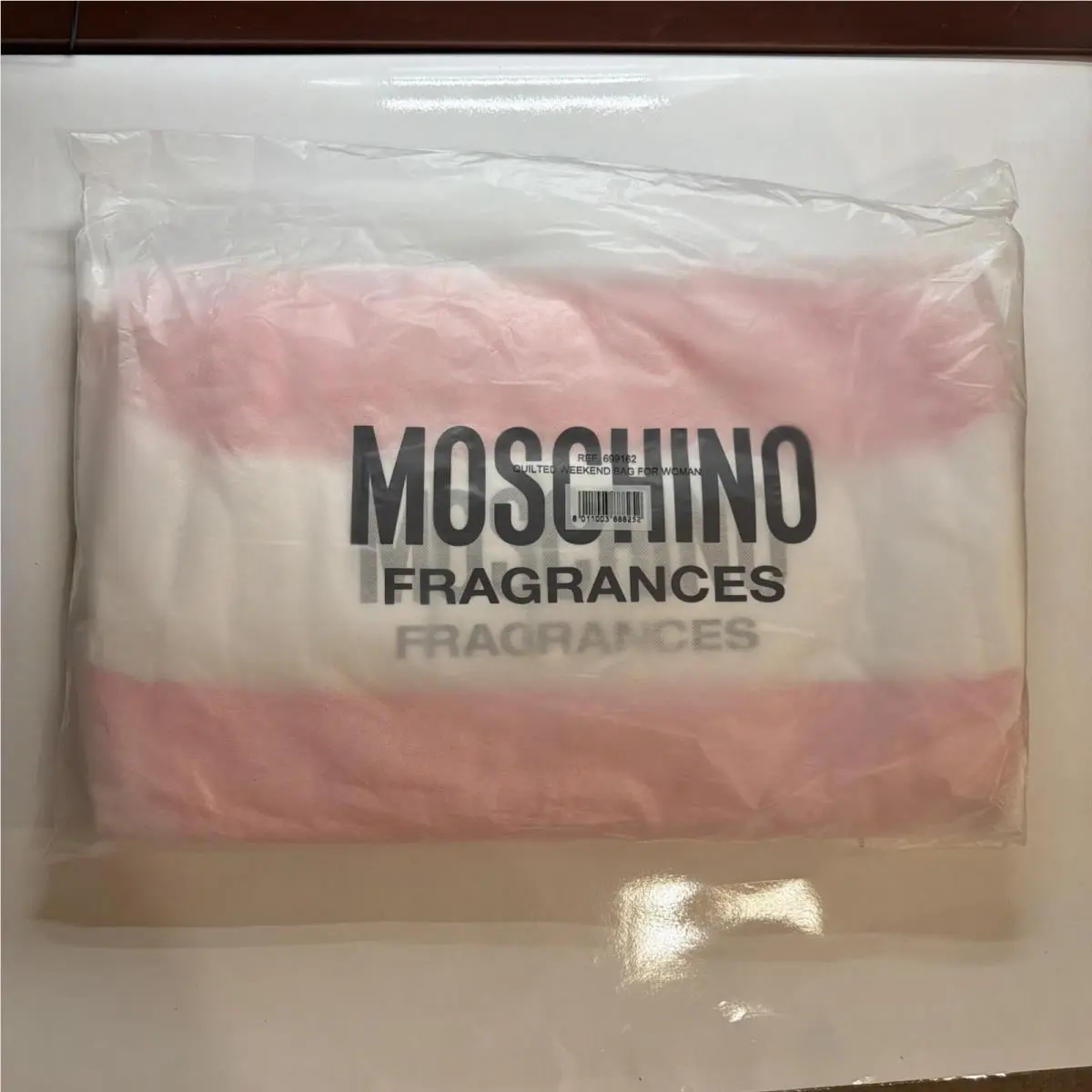 Fragrances Pink White Quilted Duffle Bag by Moschino