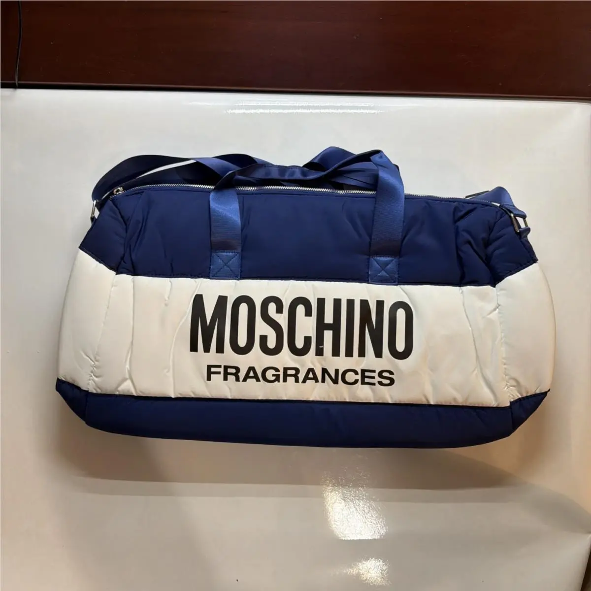 Fragrances Blue White Quilted Duffle Weekender Travel Bag by Moschino