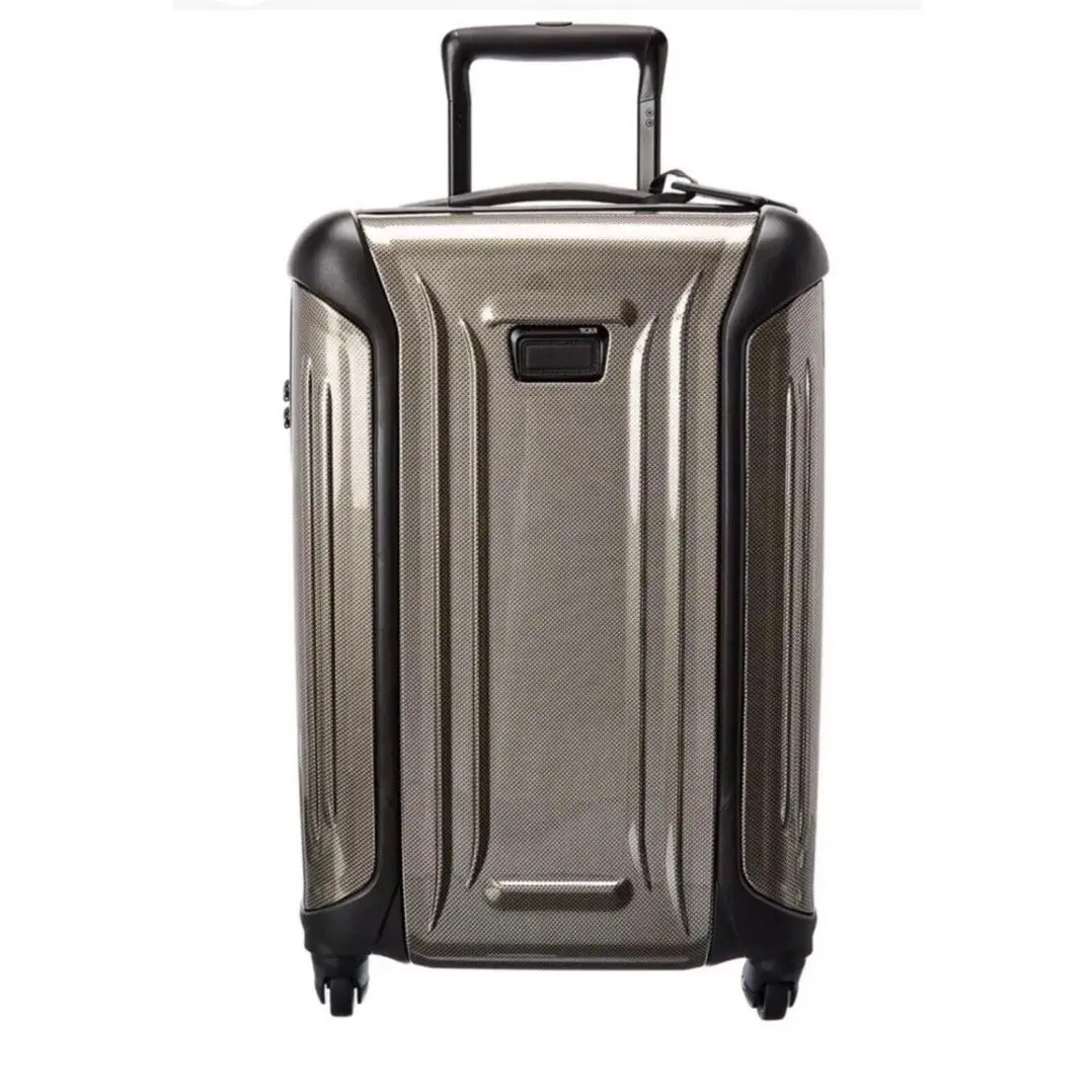 Vapor International 4 Wheeled Carry-on Hard Shell Spinner - Fossil by Tumi