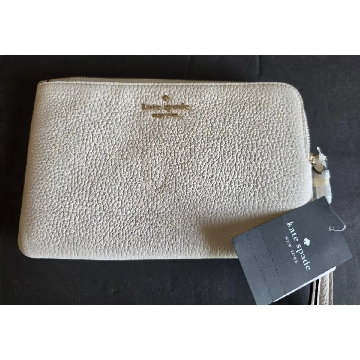 New Leather Wristlet Cream/ White by Kate Spade