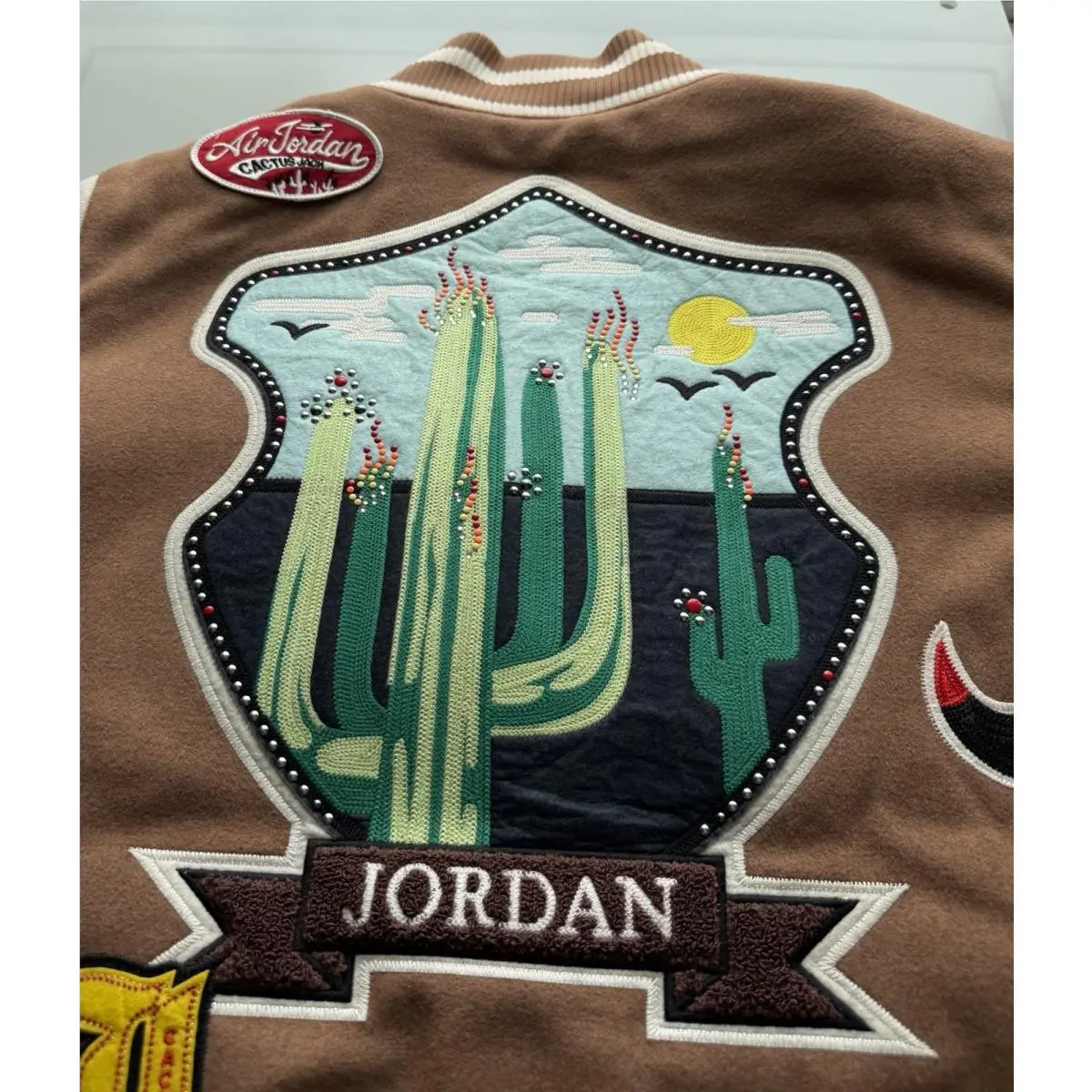 Scott clothing - Travis Scott × Jordan Varsity Jacket - DO4103-256 - Antique Brown/Cream (UPC: 190866317975) 16