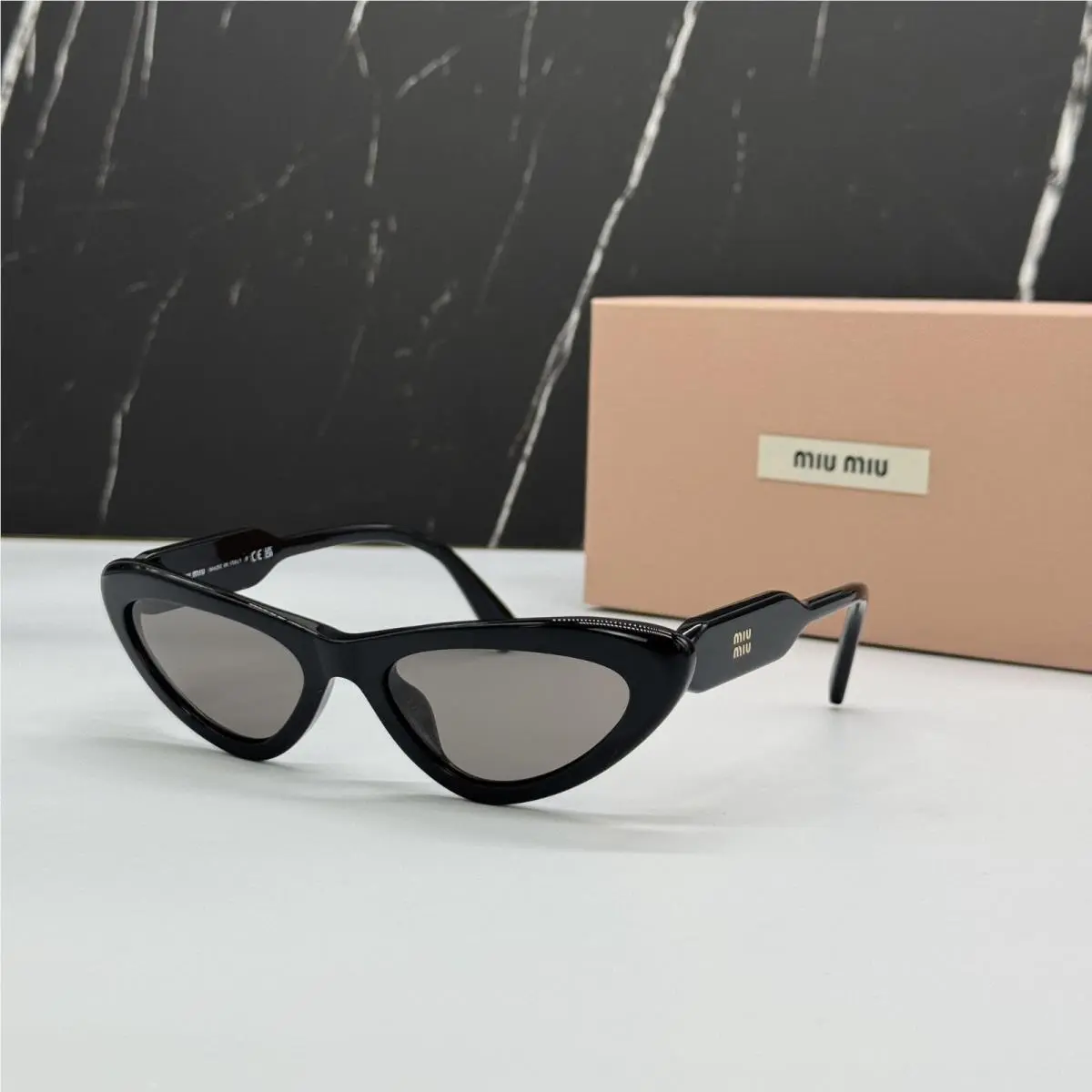 MUB11SU Black Cat Eye Sunglasses Smu B11 16K80Q by Miu Miu