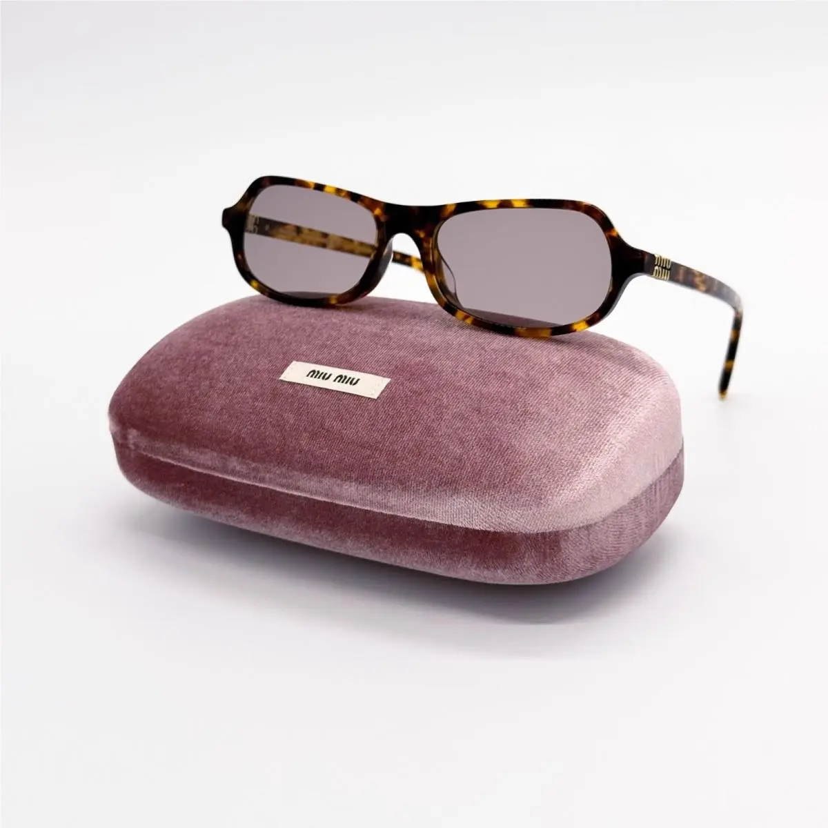 MUB10SU 14L20I Havana Purple Sunglasses by Miu Miu