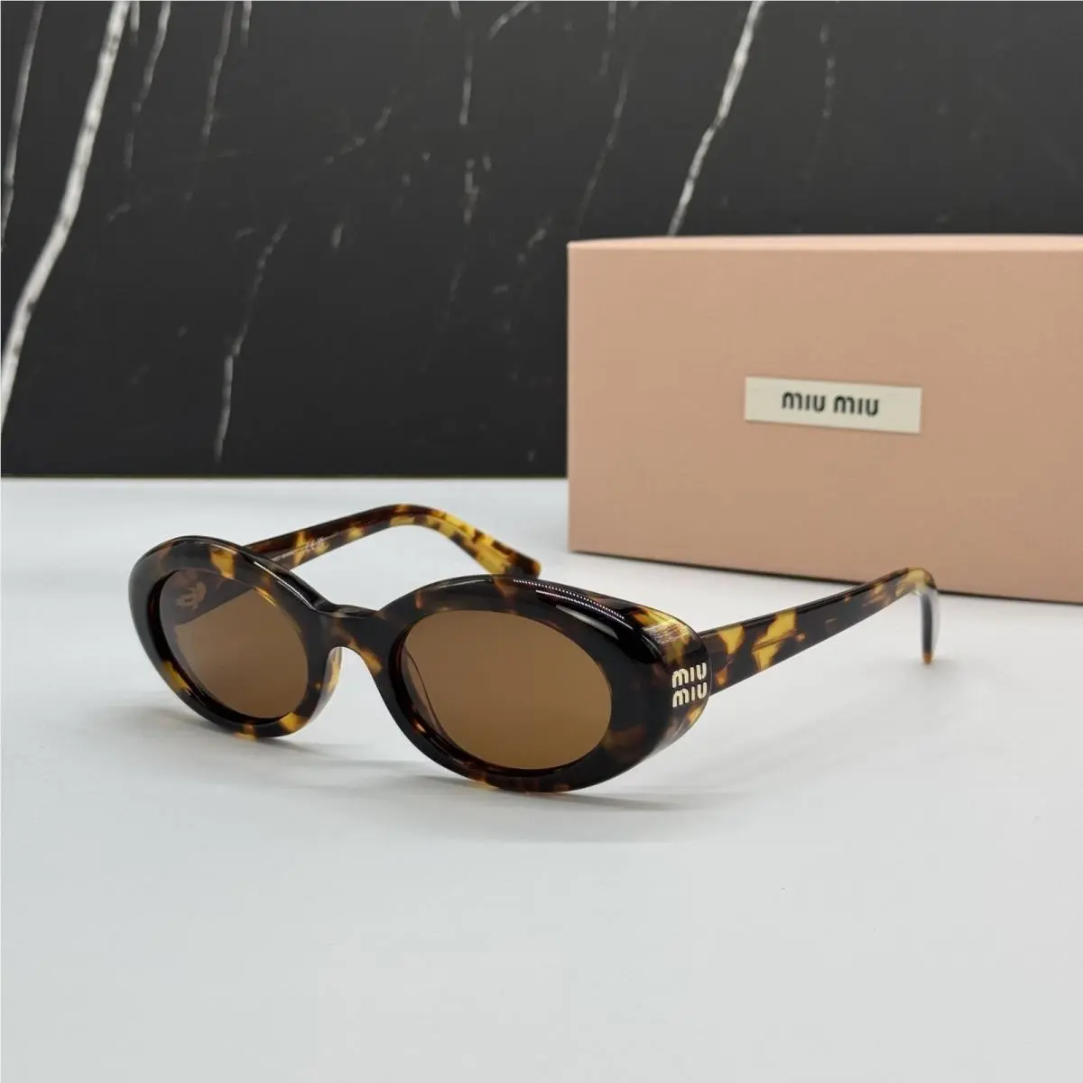 MUB09S Havana Brown Sunglasses MU B09S 14L20V by Miu Miu