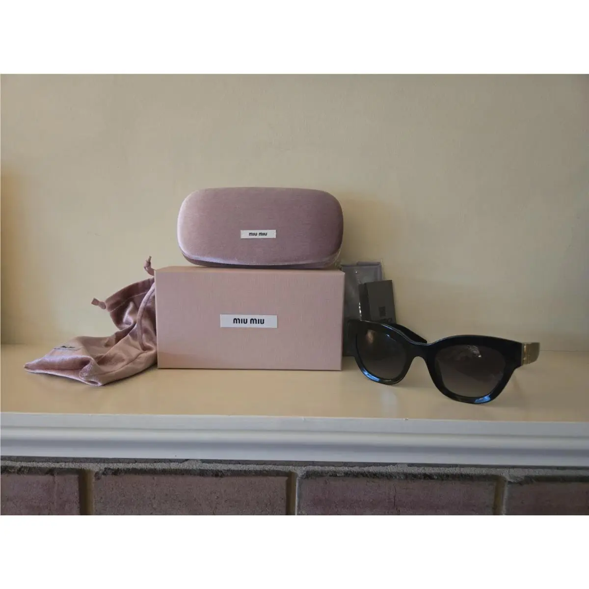 Glimps Black Cat-eye Sunglasses SMU01Y 1AB-5D1 51-22-135 by Miu Miu