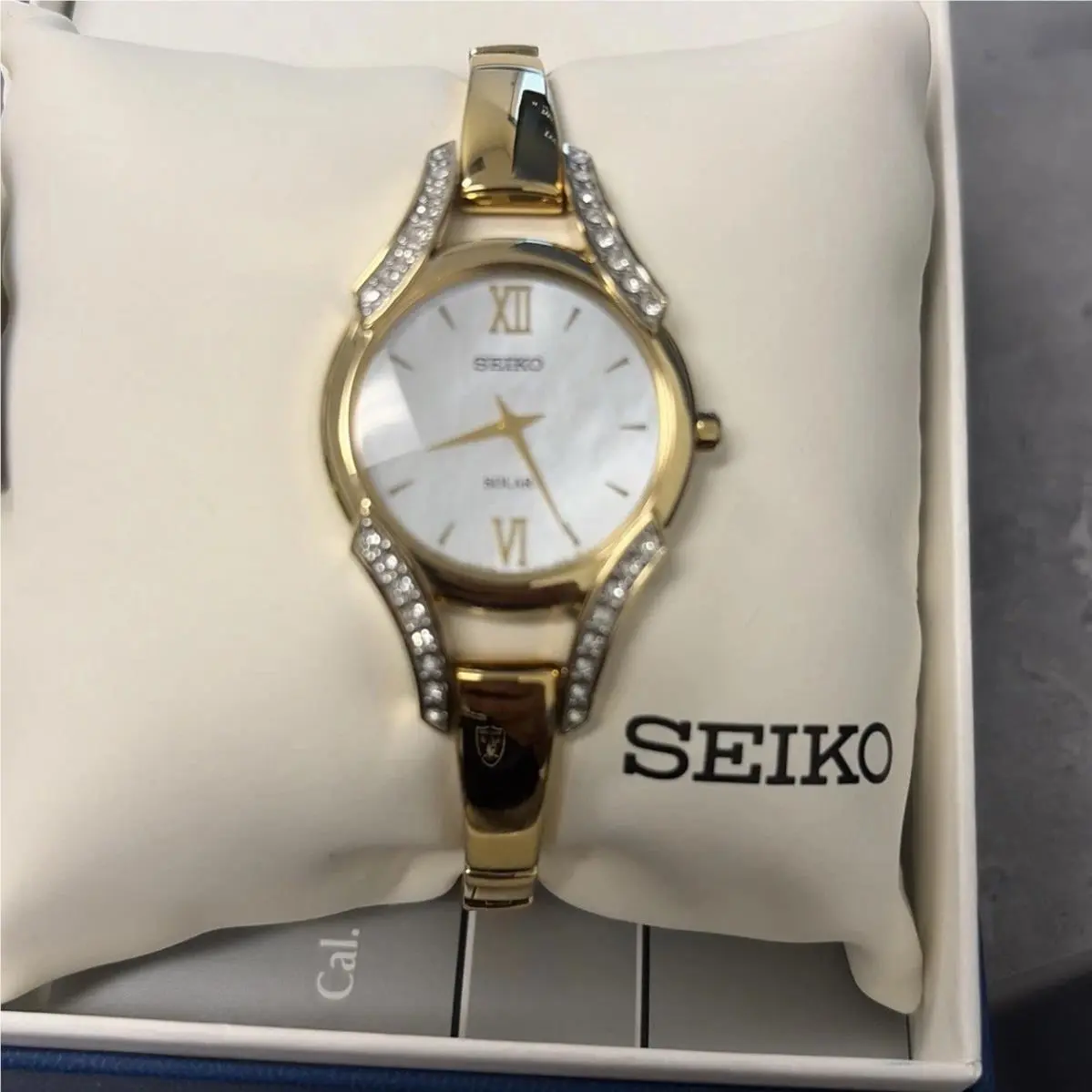 Solar Watch Women 28mm Mop Dial Gold Tone Round SUP216 Crystals by Seiko