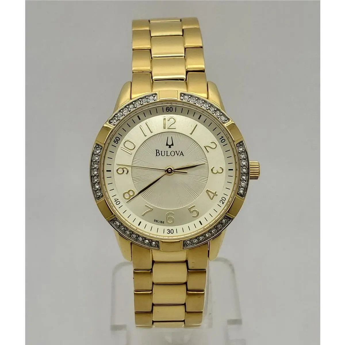 98L186 Yellow Gold Tone Champagne Dial Crystal Bezel Womens Dress Watch by Bulova