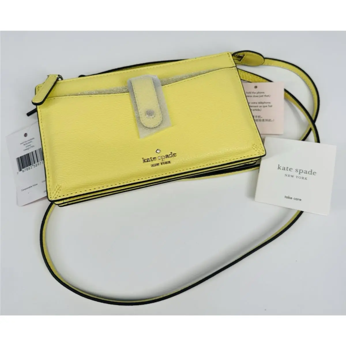 Jackson Small Tab Yellow Pebbled Leather Crossbody Accordion Bag by Kate Spade