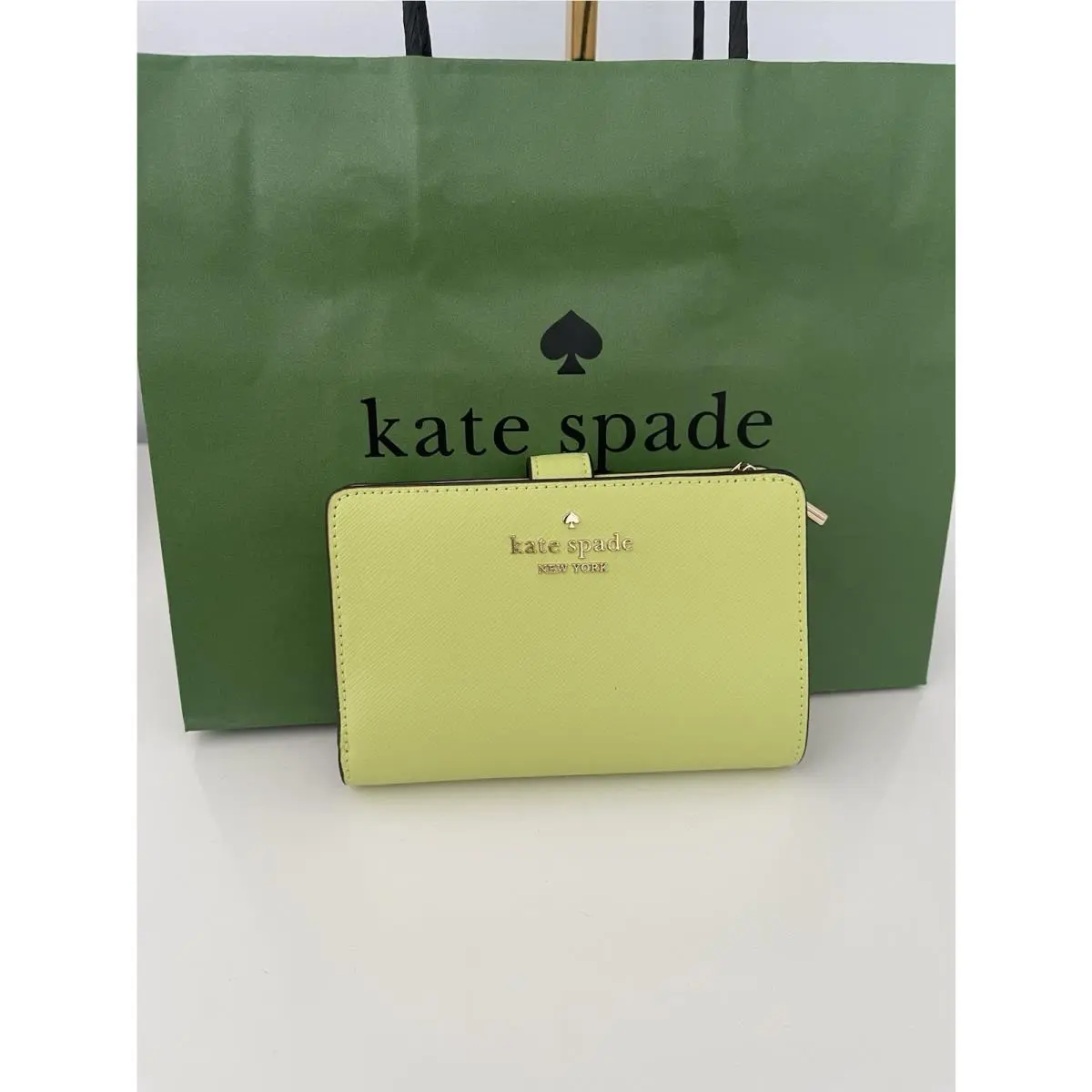 Madison Medium Compact Bifold Wallet In Lime Slush by Kate Spade