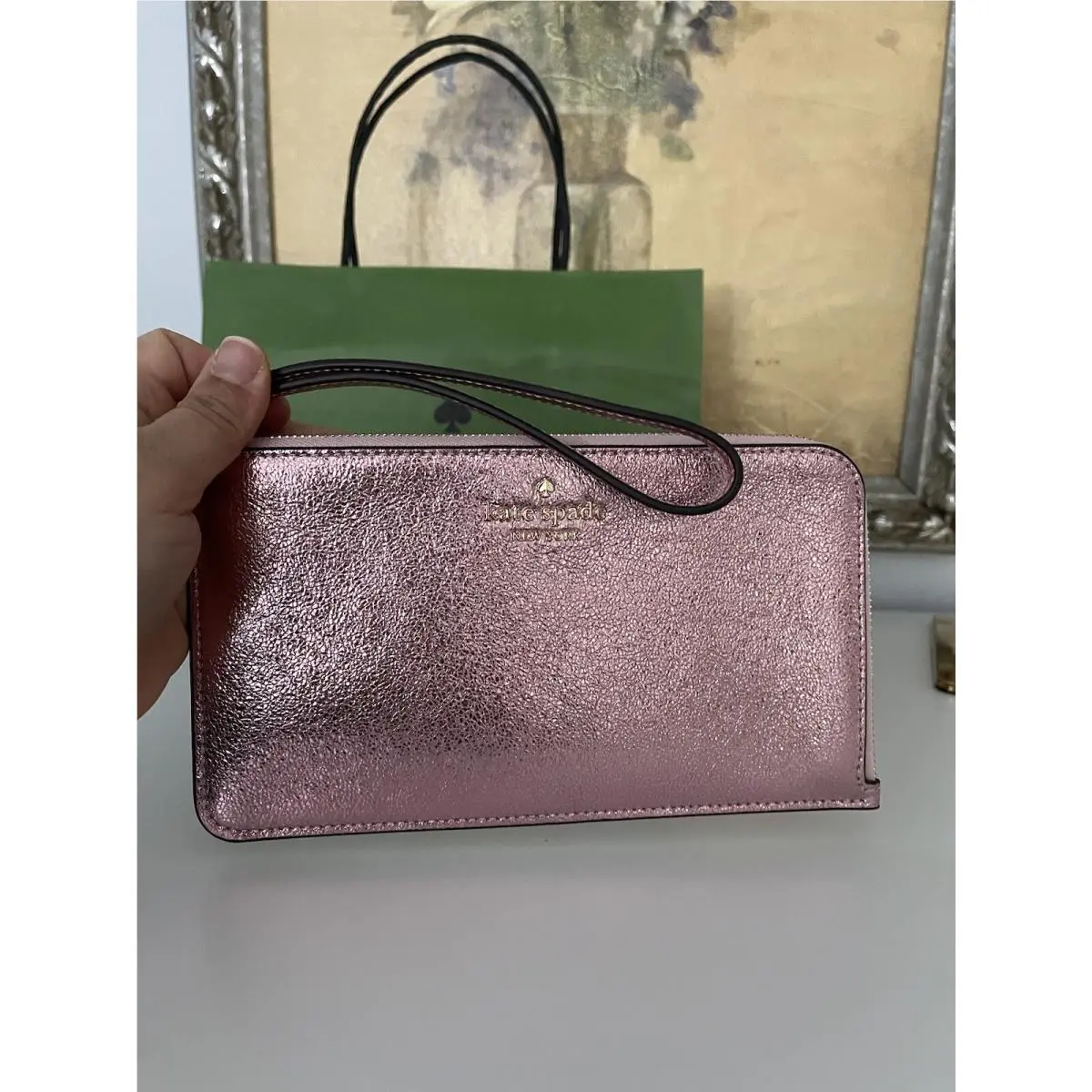 Lucy Medium L-zip Wristlet Phone Holder In Metallic Pink by Kate Spade