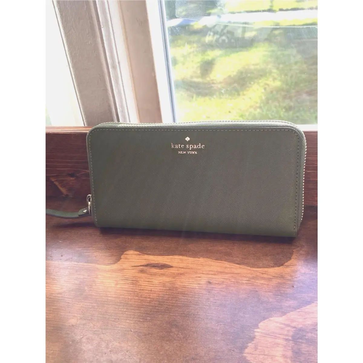 New Neda Saffiano Zip Wallet 7.5 L x 1 W x 4 H by Kate Spade