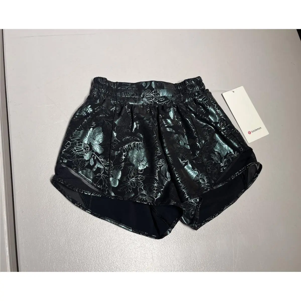 Lululemon Shorts Women’s 2 Hotty Hot Lined Logo Flourish Black Iridescent Foil