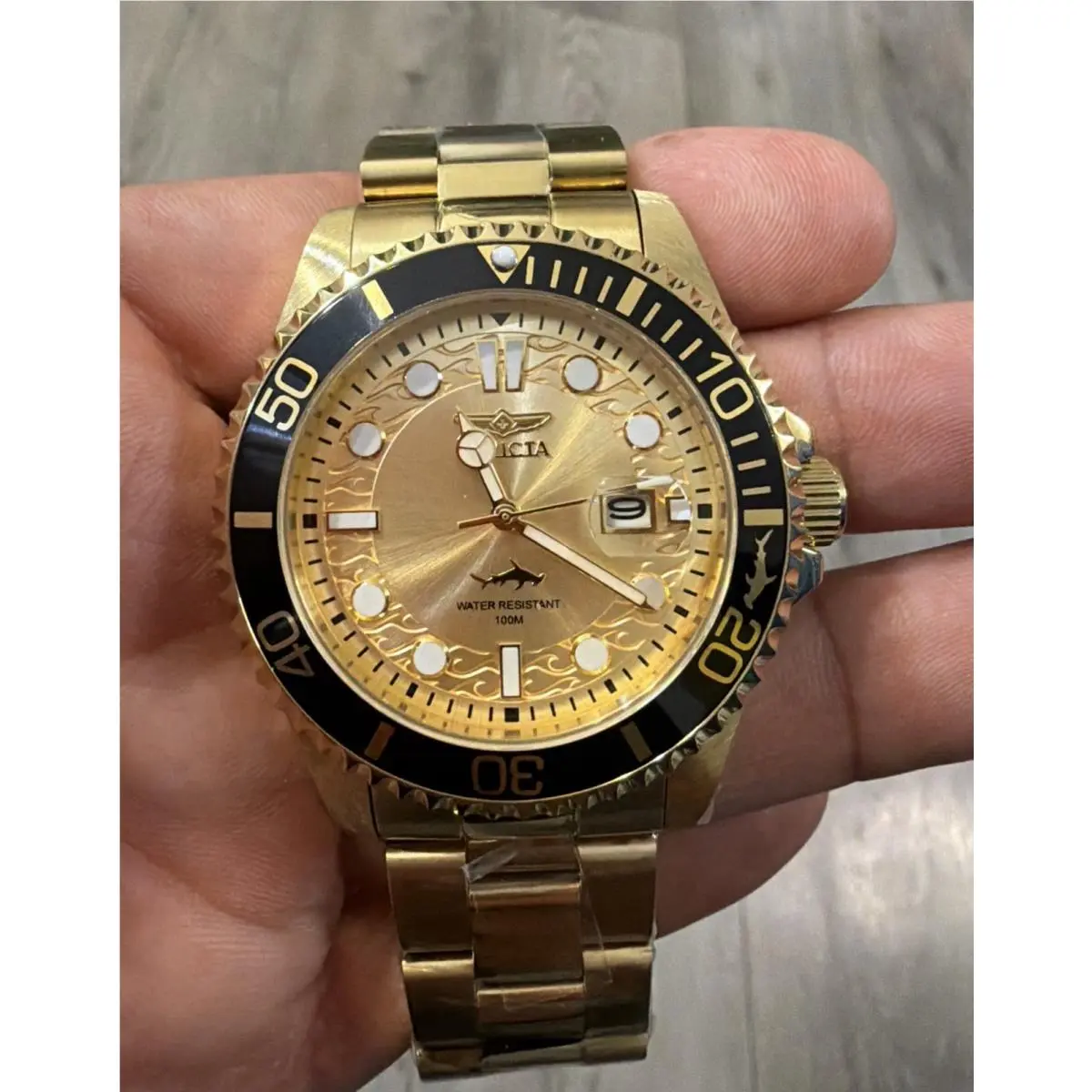 Pro Diver 23045 Gold Tone Black Bezel Quartz Men’s Watch Box by Invicta