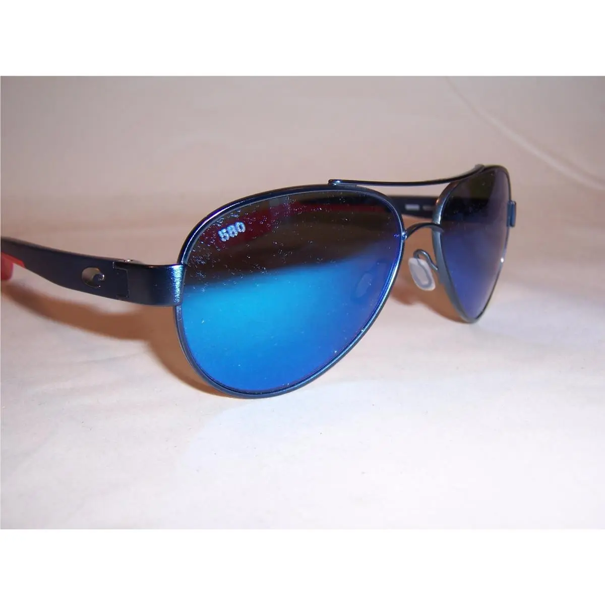 Loreto Sunglasses Brushed 250TH Blue/blue 580G Polarized by Costa Del Mar