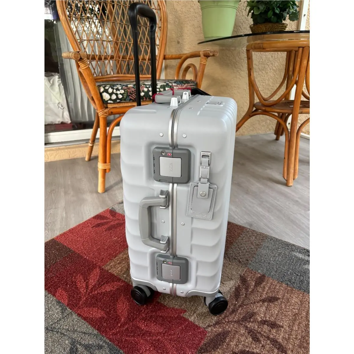 International 4 Wheeled Carry On Suitcase Color: Pearl Grey Texture by Tumi