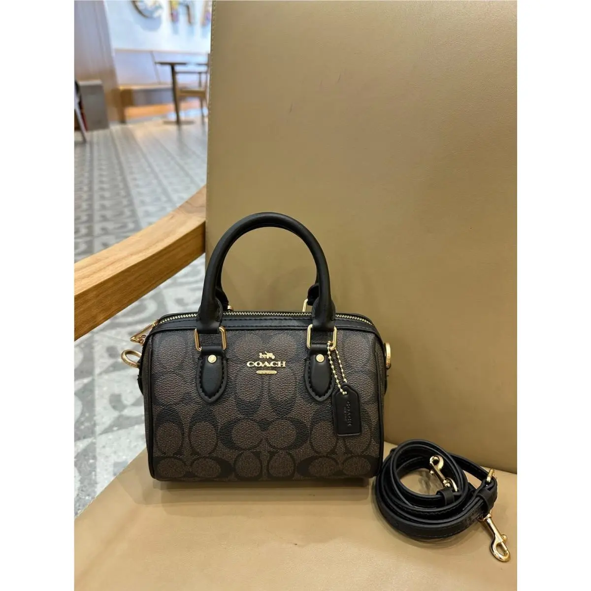 CEK79 Mini Rowan Crossbody Bag In Signature Canvas Powder Pink Brown by Coach