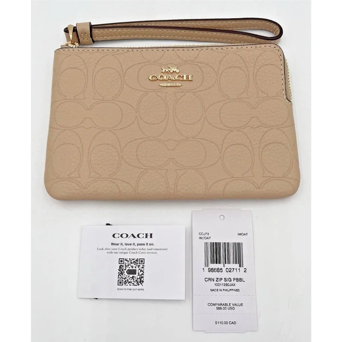 Coach CCJ73 Women`s Corner Zip Signature Pebbled Leather Wristlet - Oat