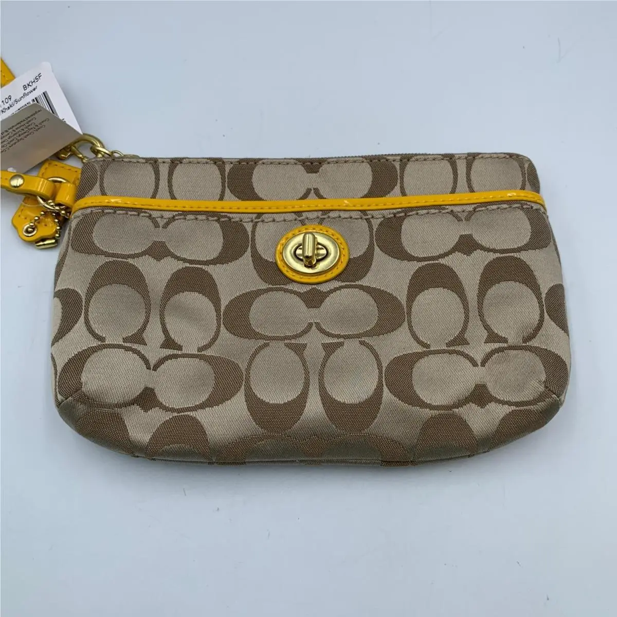 Coach Campbell Signature Medium Wristlet Pouch Khaki Sunflower Turnlock Handbag