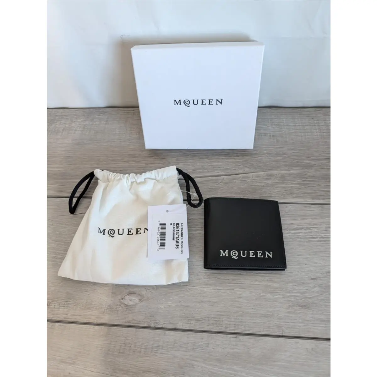 Alexander Mcqueen Black Leather Bifold Wallet 4 x4 Graffiti Logo by Alexander McQueen