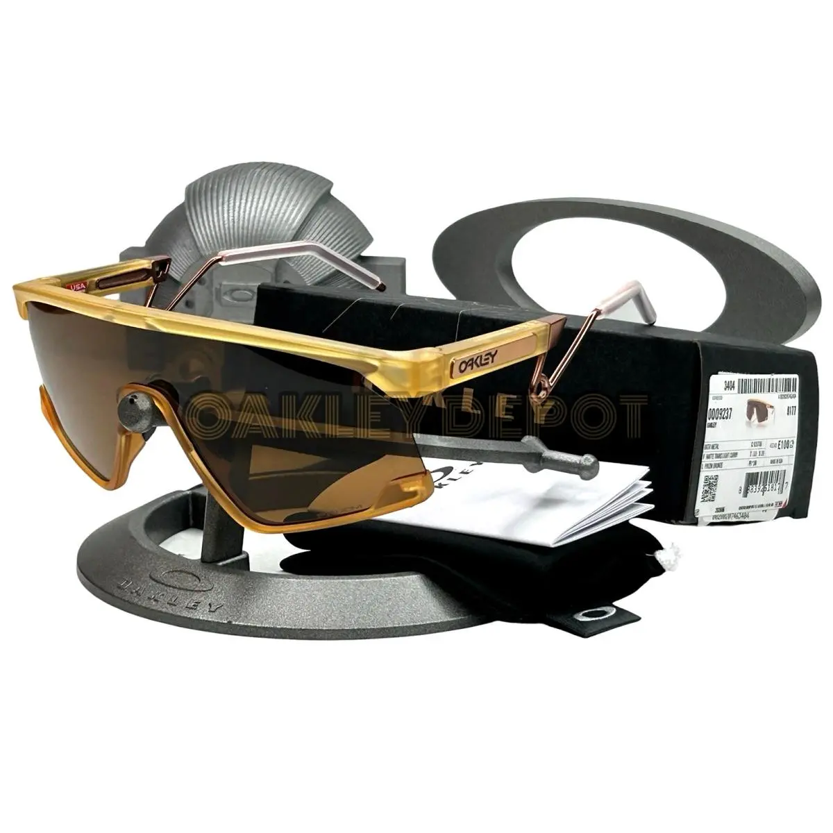 Oakley Bxtr Metal 009237 Matte Trans Light Curry/prizm Bronze Sunglasses 27 - Frame: MATTE TRANSLUCENT LIGHT CURRY, Lens: BRONZE
