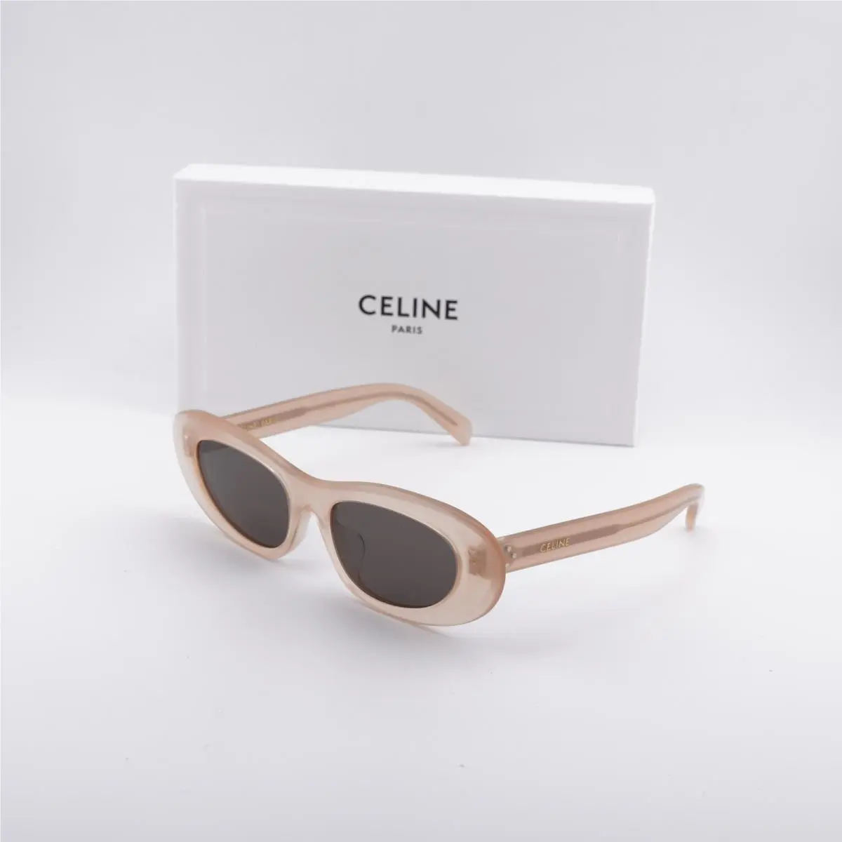 CL40310U 74A Opaline Peach/solid Smoke 54-18-145 Sunglasses by Celine
