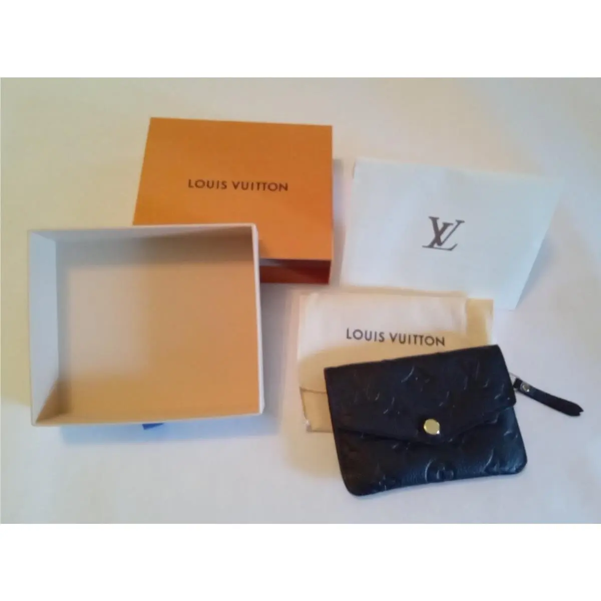 Beautiful  M60633 Monogram Empreinte Pochette Cles Purse by Louis Vuitton