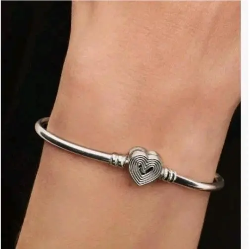 Radiating Heart Clasp Bangle Bracelet In Sterling Silver 21cm by Pandora