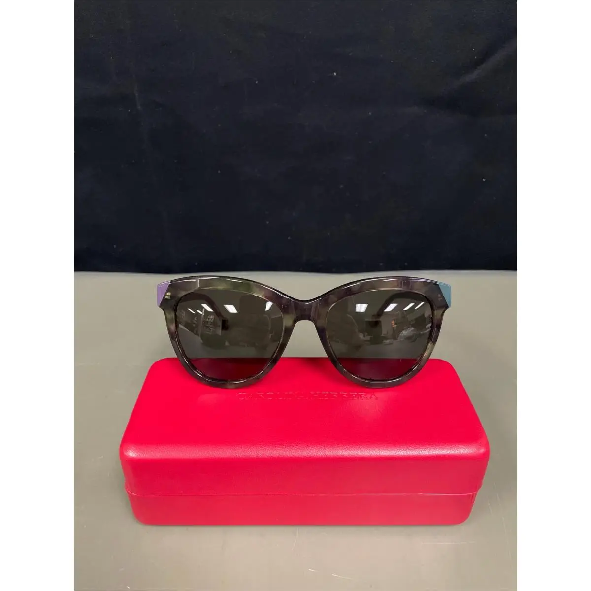 Carolina Herrera Smoke Grey Cat Eye Ladies Sunglasses SHE743 07D7 52
