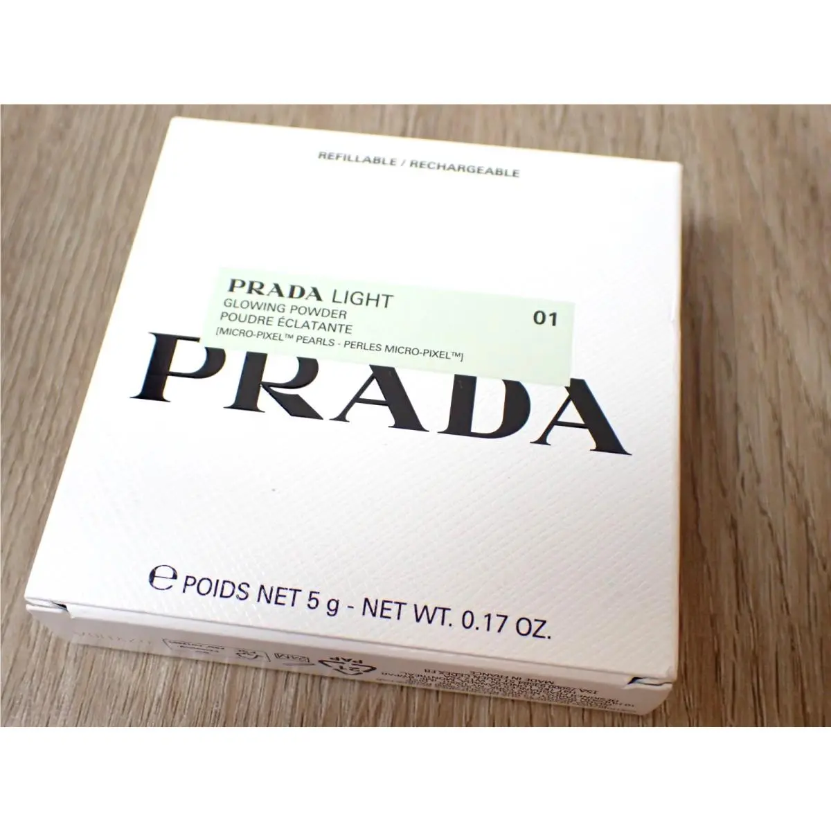Light 01 Glowing Powder .17 OZ Champagne Long Wear Foundation by Prada