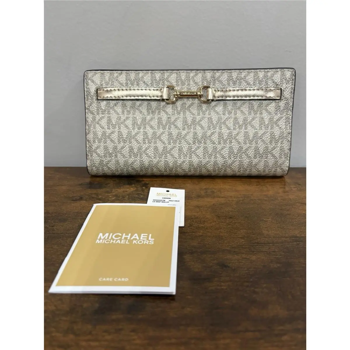 Carson In Pale Gold Signature Large Snap Wallet by Michael Kors