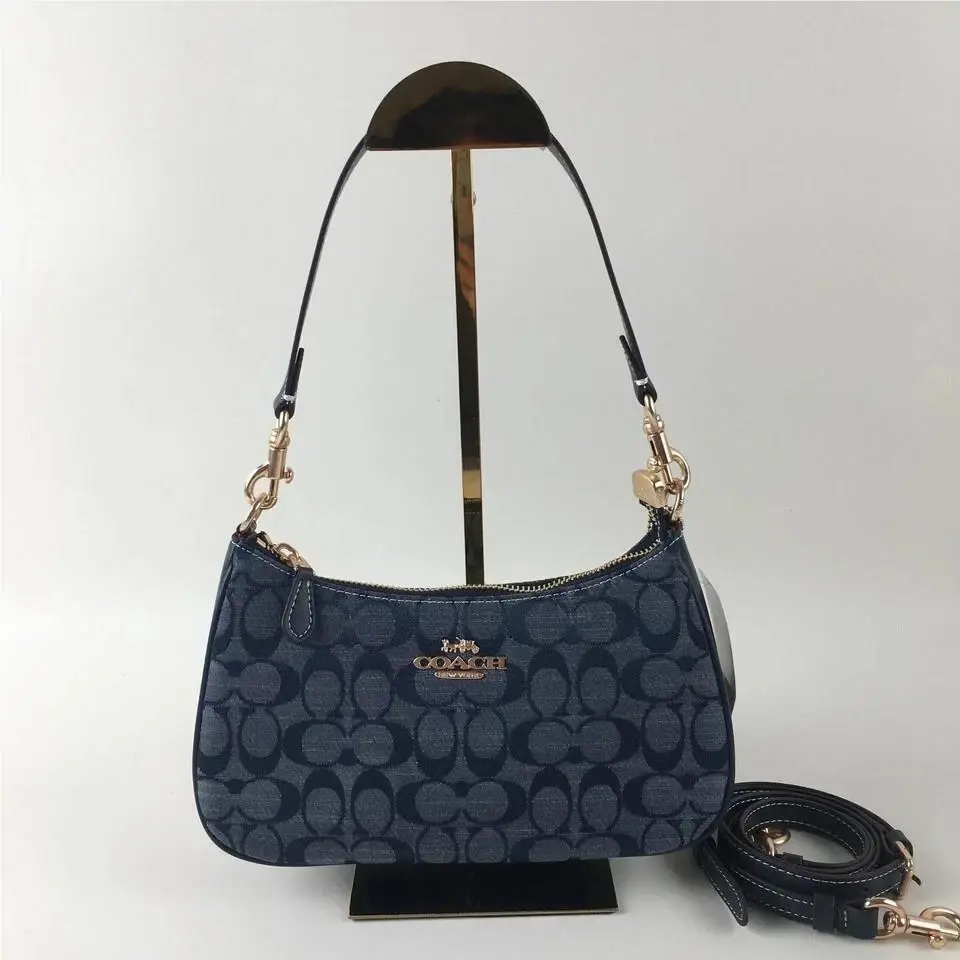 Teri Shoulder Bag In Signature Canvas in Multiple Colors Blue by Coach