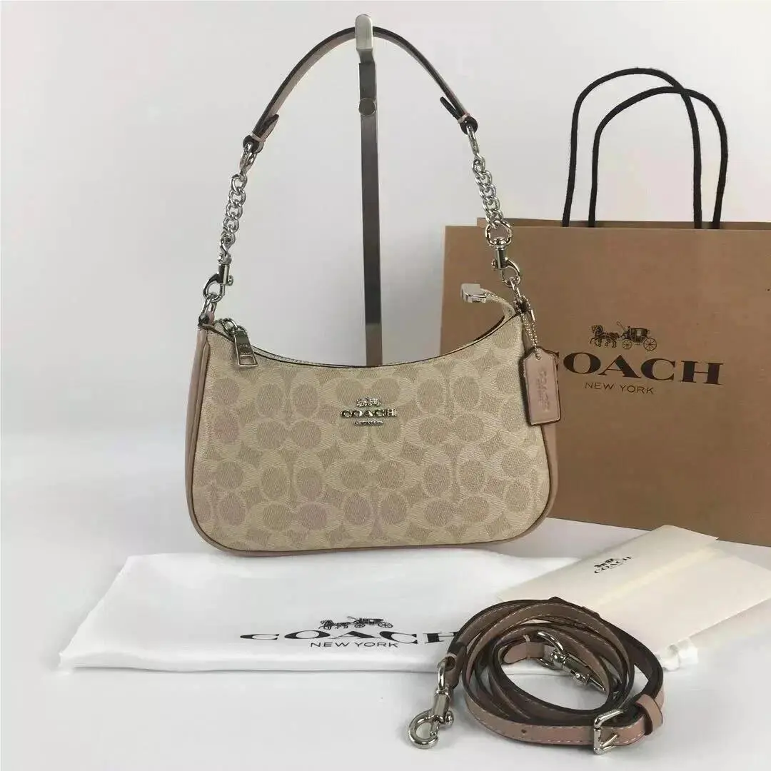 Teri Shoulder Bag In Signature Canvas in Multiple Colors Gold by Coach