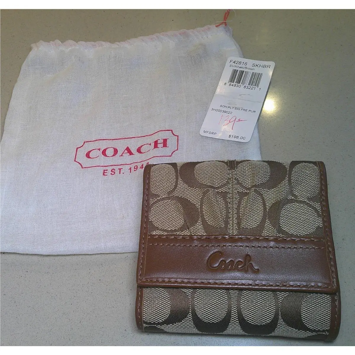 Signature Canvas Leather Soho Pleated Bifold Wallet by Coach