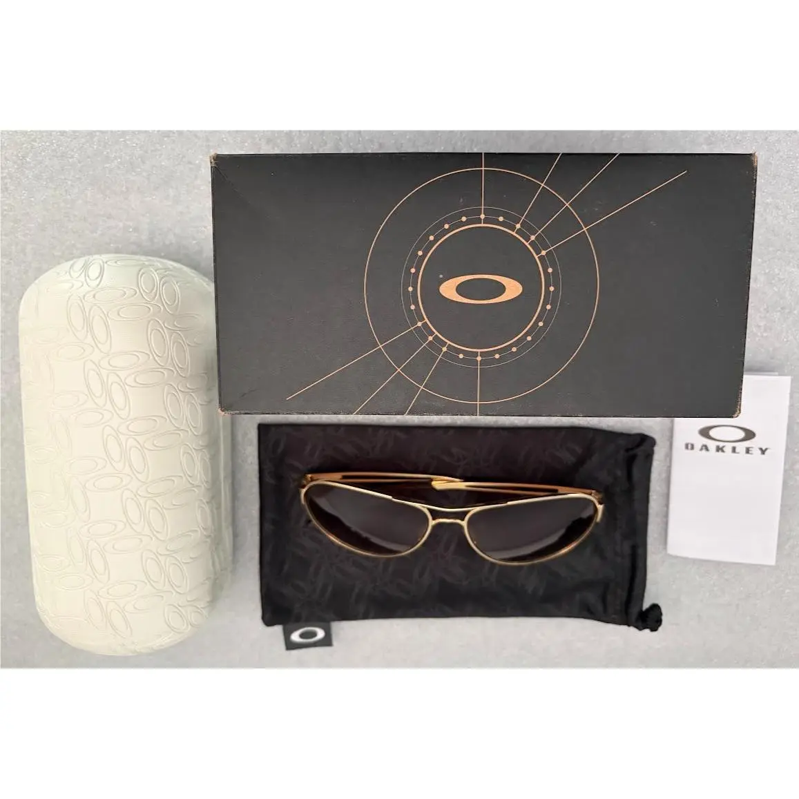 Oakley Caveat OO4054-0760 Sunglasses 60-14-137 Polished Gold/dark Brown Gradient