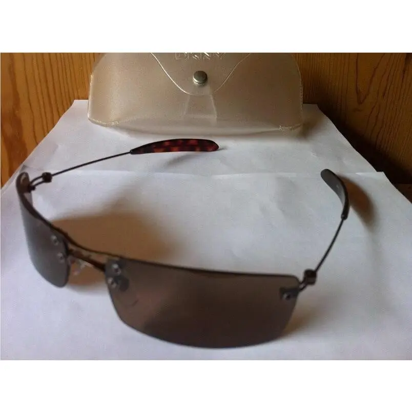 Oakley Dkny 7261S 705 Sunglasses Shiny Bronze / Dark Brown Lenses