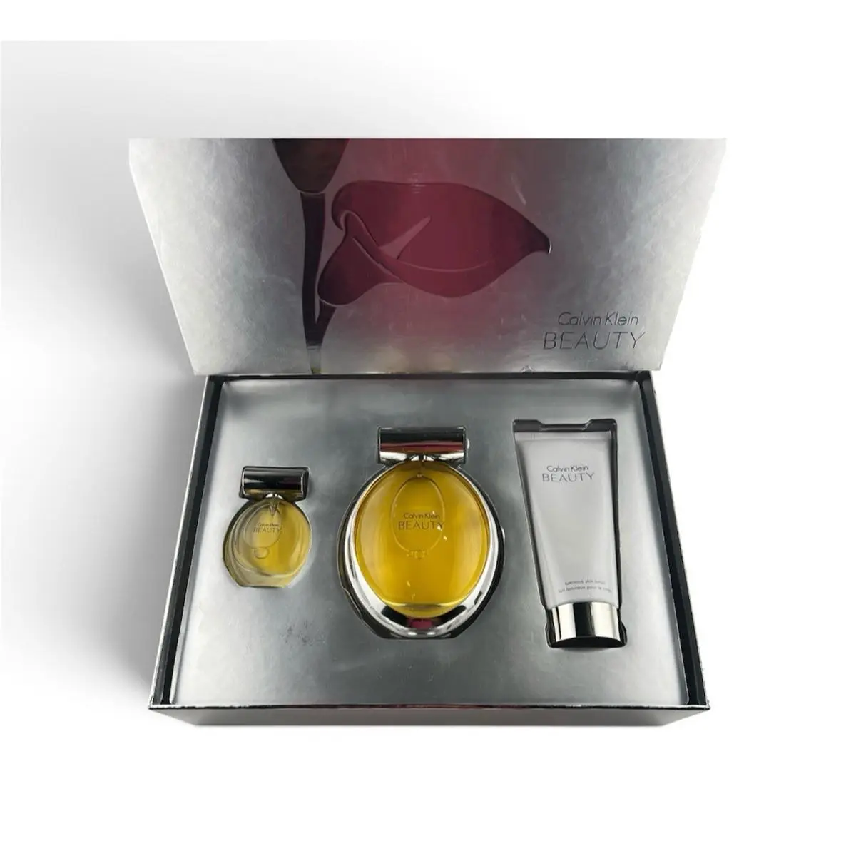 Calvin Klein 3 Piece Gift Set 3.4 oz .5oz Eau De Parfum Spray 3.4 oz Lotion