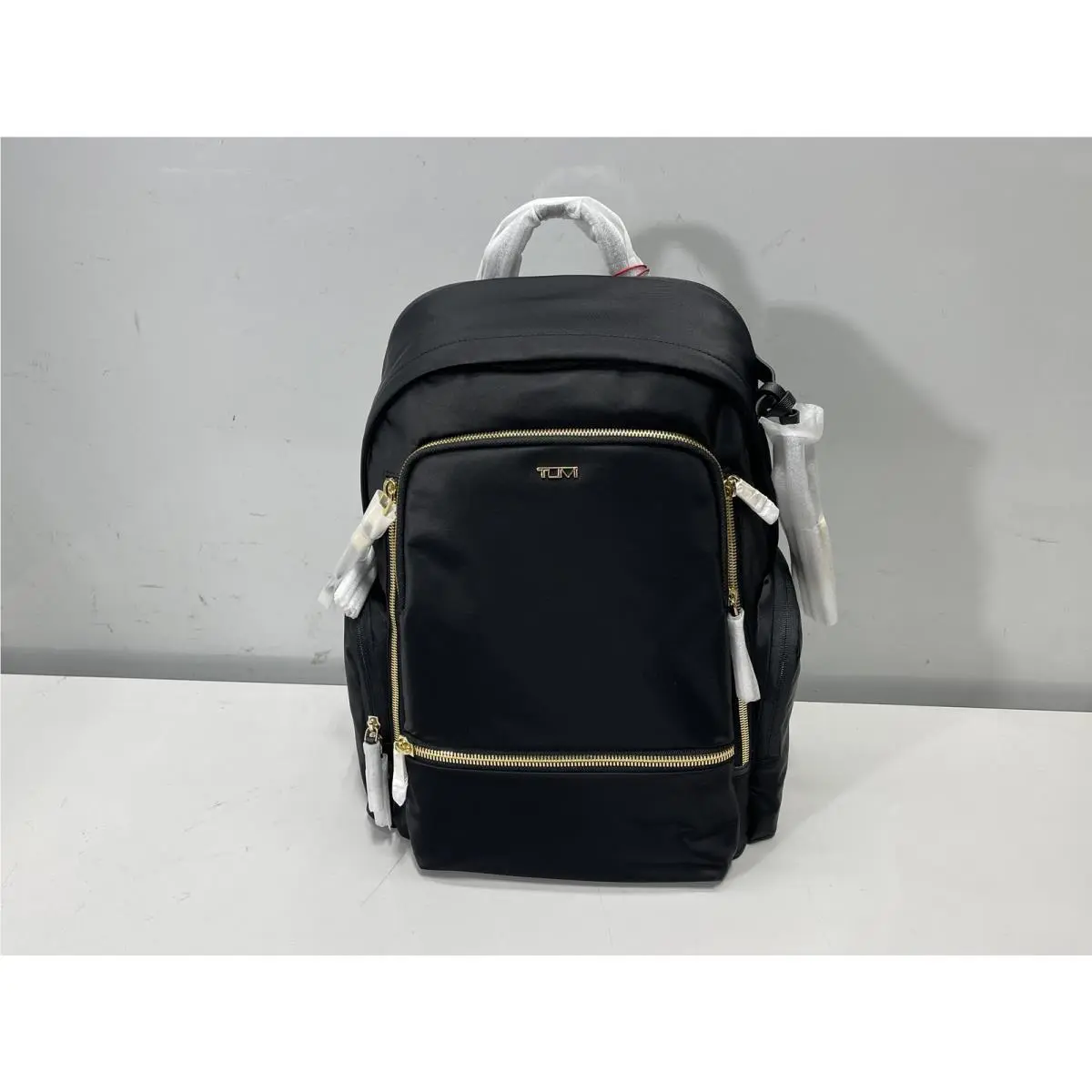 Tumi - Voyageur Celina Backpack - Black/gold