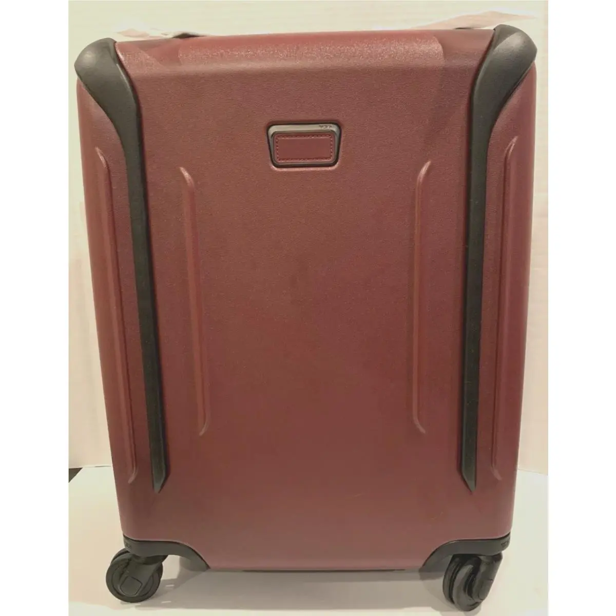 Tumi Vapor 22 - Continental - Hardcase Spinner - Sold Burgandy Color
