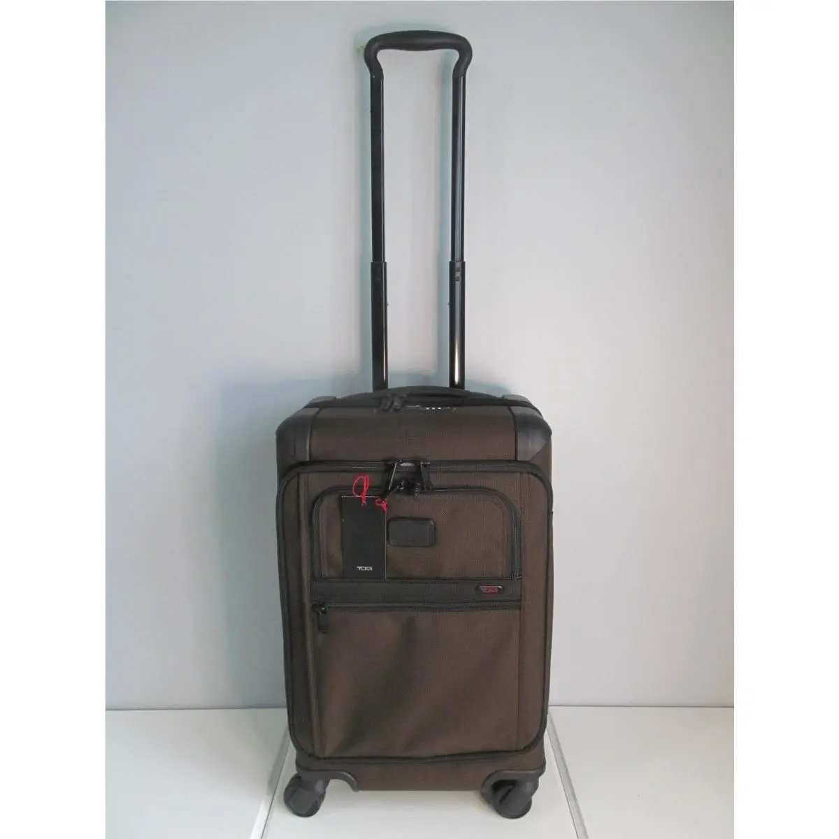 Tumi International Front Lid Brown Expandable 22 Carry On Spinner