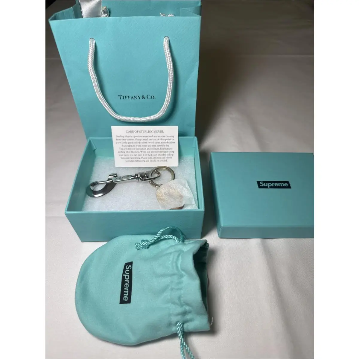 FW21 Supreme x Tiffany Co Return To Tiffany Oval Tag Keyring Read Desc