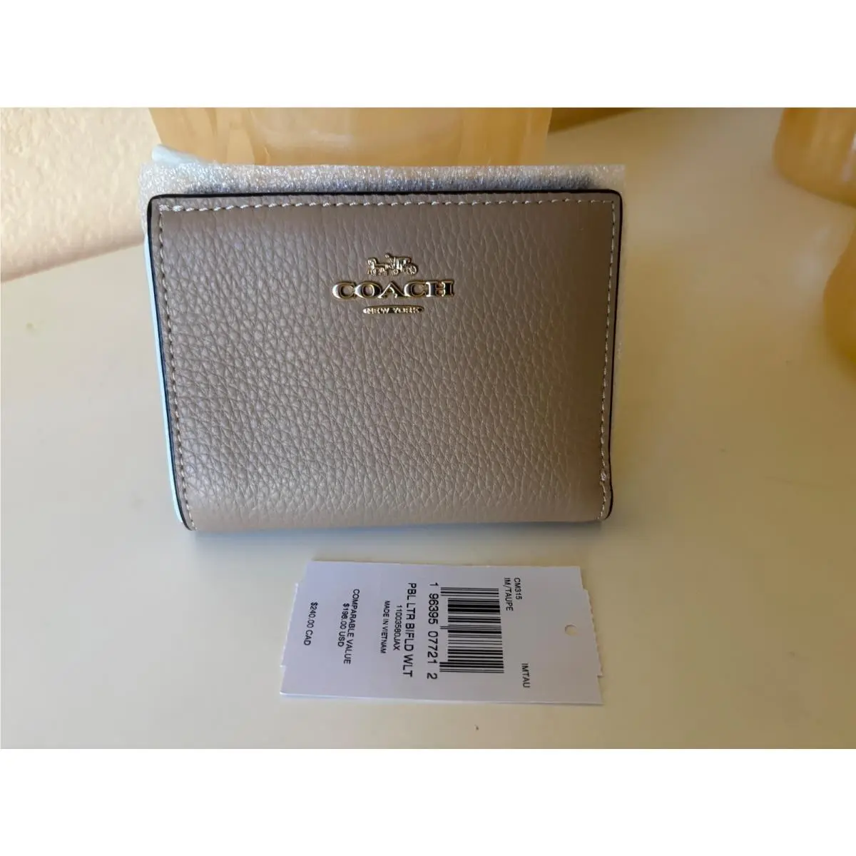 Coach Pebbled Leather Bifold Wallet Taupe CM315