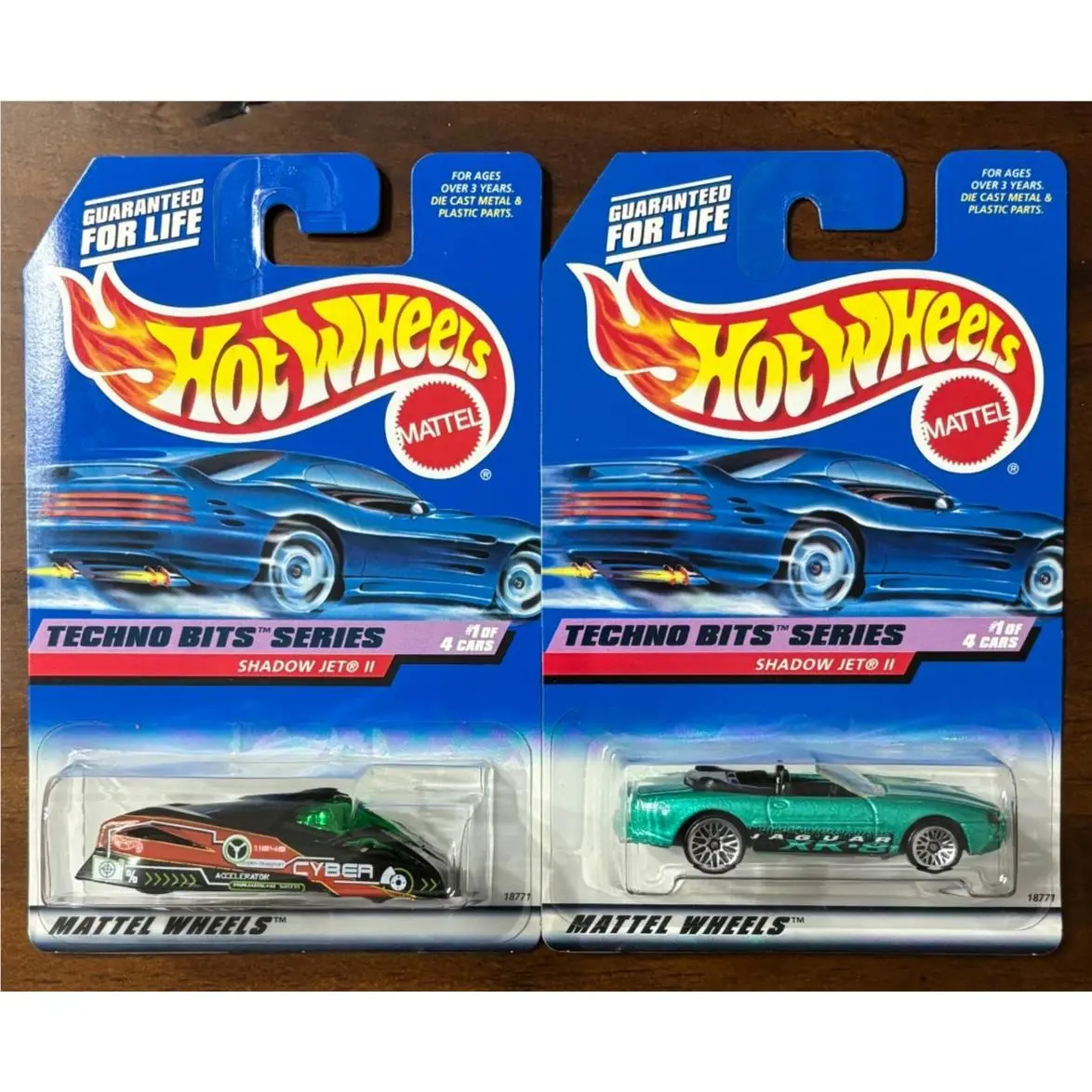 Hot Wheels Error Jaguar XK8 on Techno Bits Shadow Jet II Card 1998
