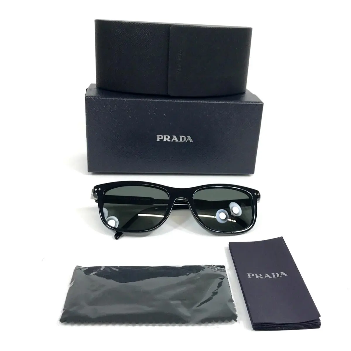 Prada Sunglasses SPR18Y 1AB-03R Polished Black Frames Gray Polarized Lenses
