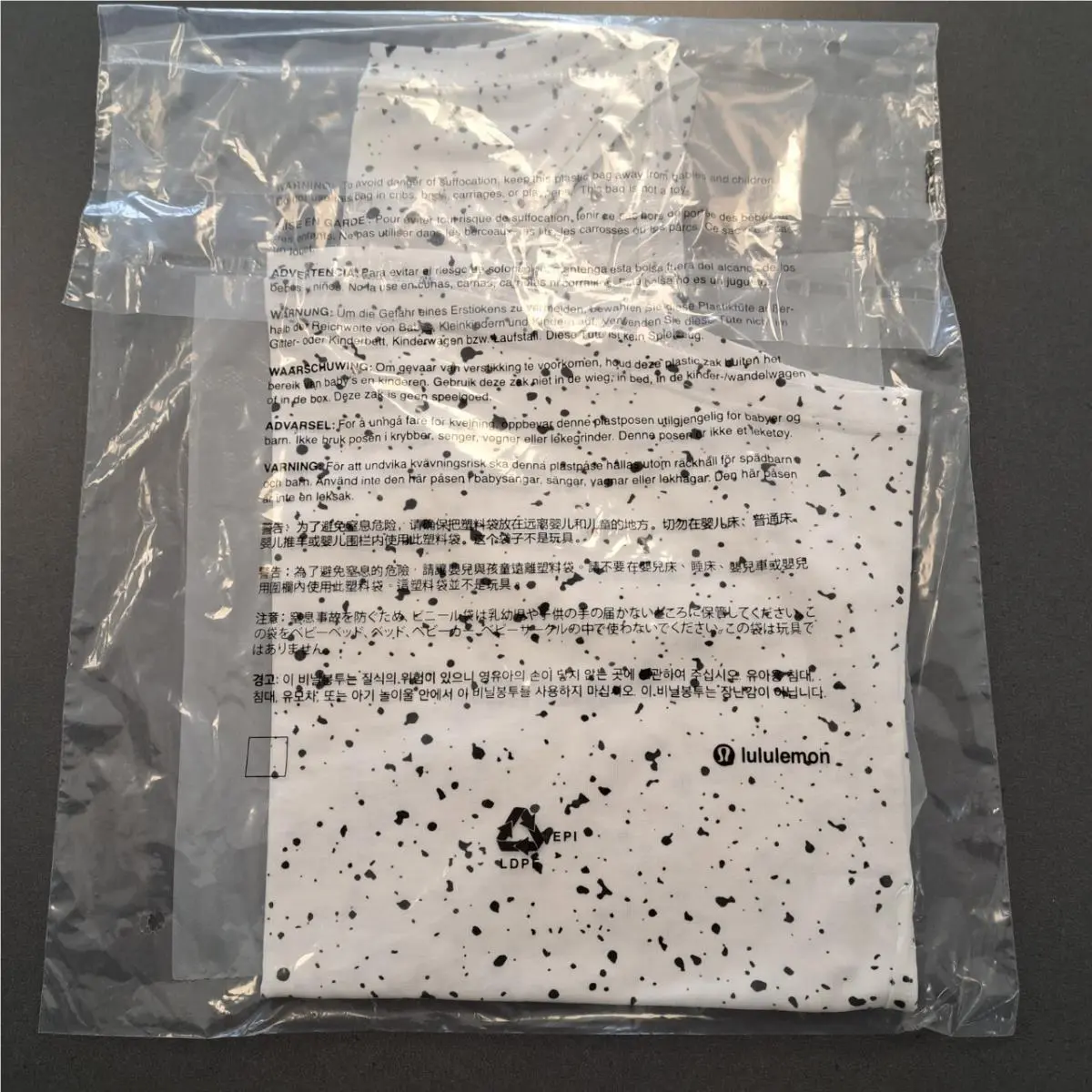 Lululemon clothing - Revitalize Splatter White Graphite Grey 1