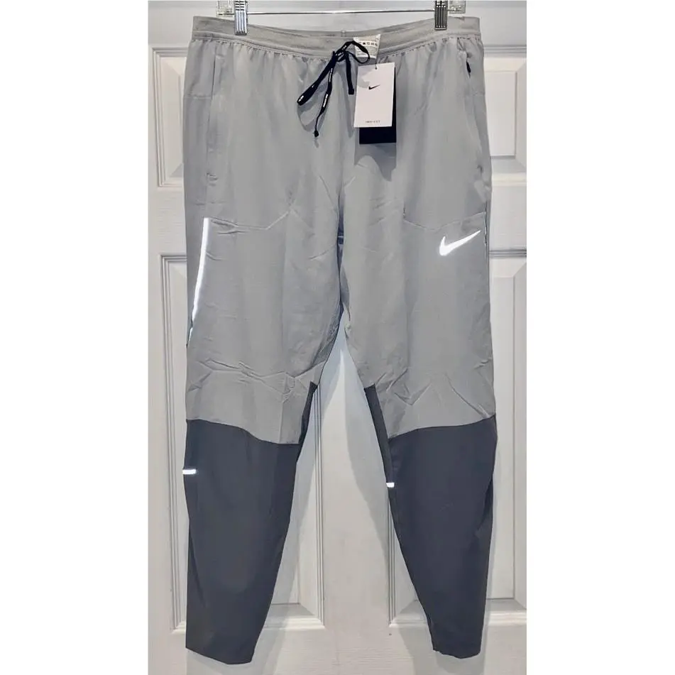 Nike clothing - NIKE Swift Hybrid Ventilated Slim Fit Running Pants - CU5493 - Gray 20