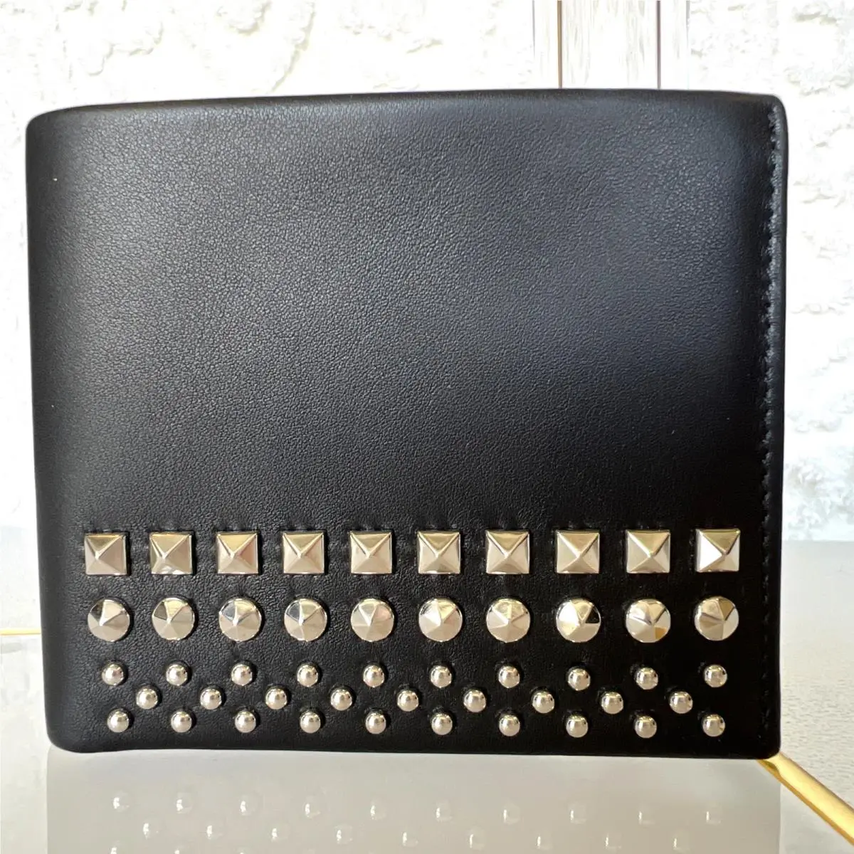 Gucci Men`s Studded Black Leather Sleek Bi-fold Wallet
